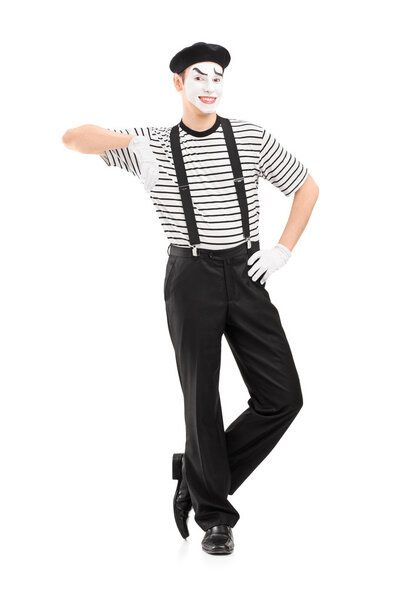 Male mime artist posing