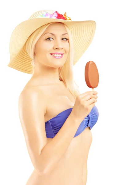 Woman eating an ice cream Stock Picture