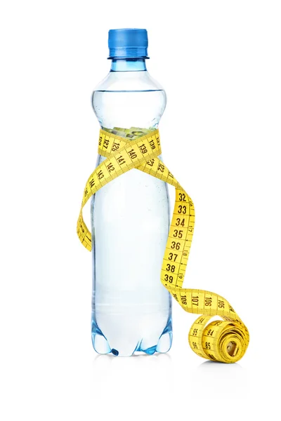 Yellow tape measure and water bottle — Stock Photo, Image