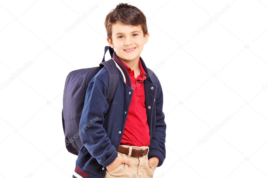 School boy with backpack standing