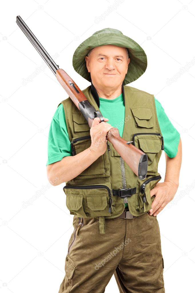 Ale hunter holding rifle