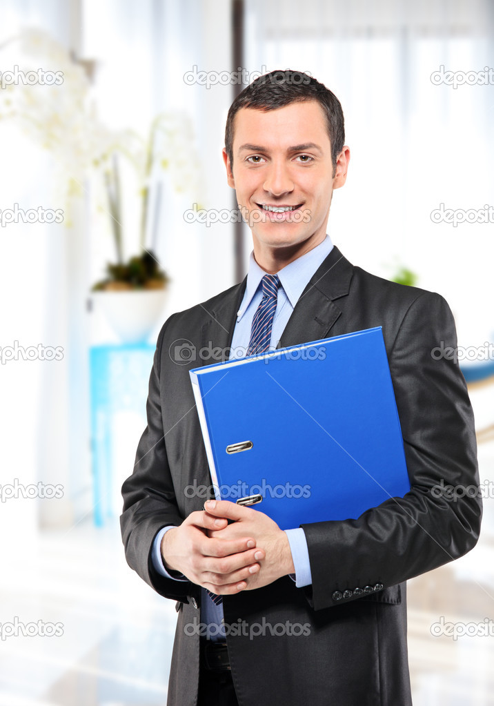 Businessman with blue folder