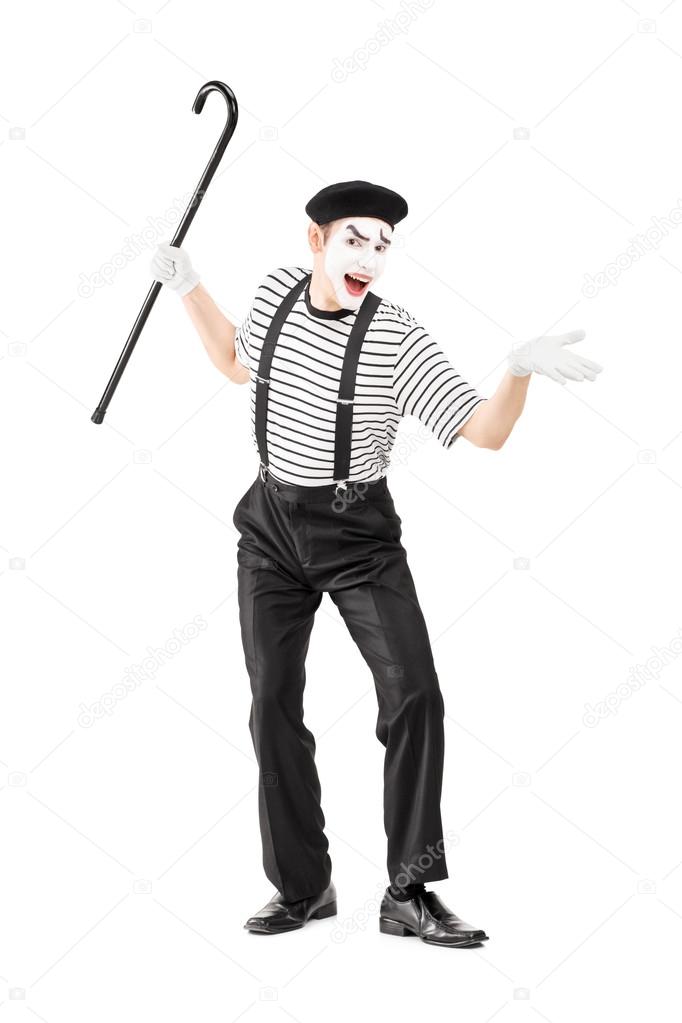 Mime artist holding cane