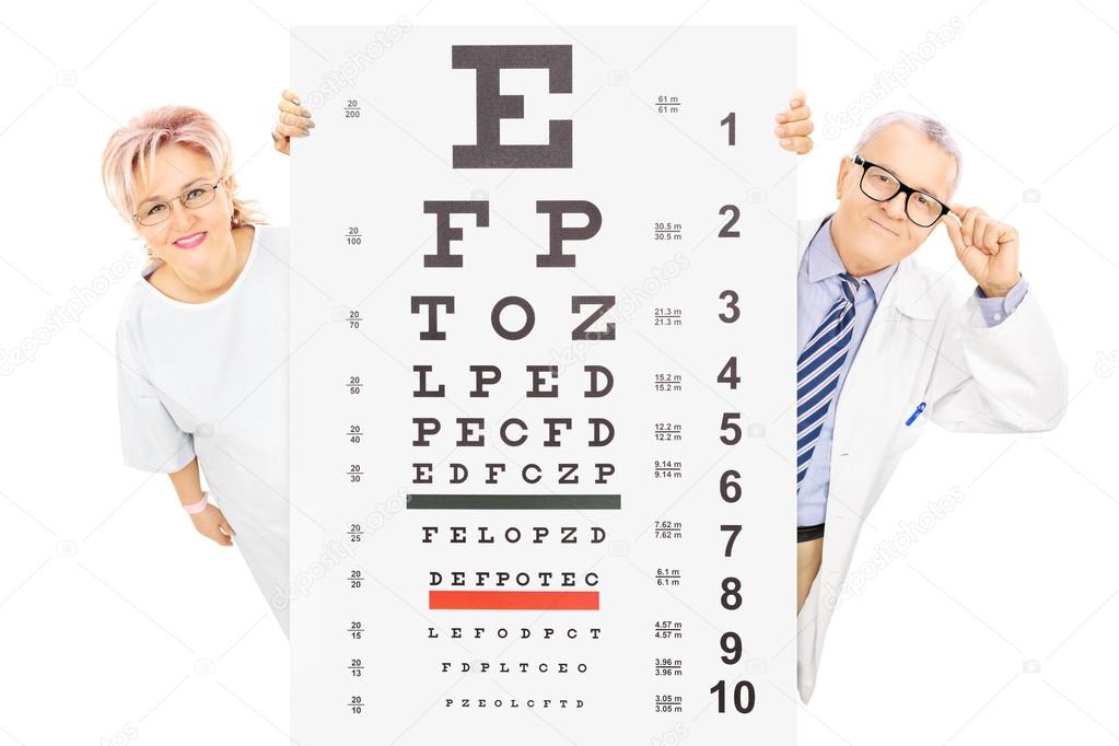 Doctor and patient standing behind eyesight test