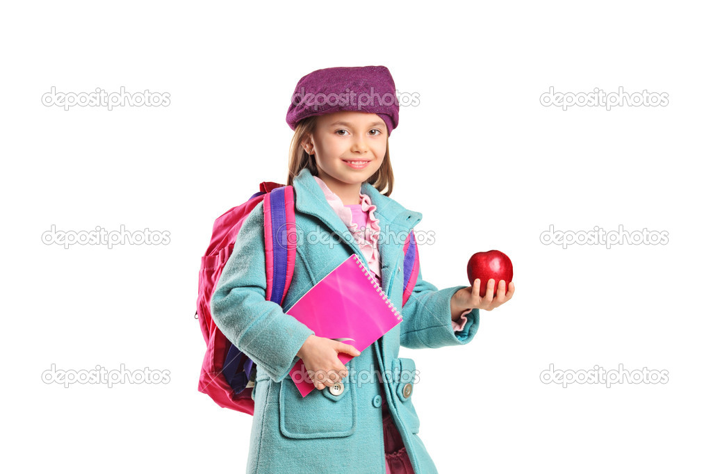 School girl holding apple
