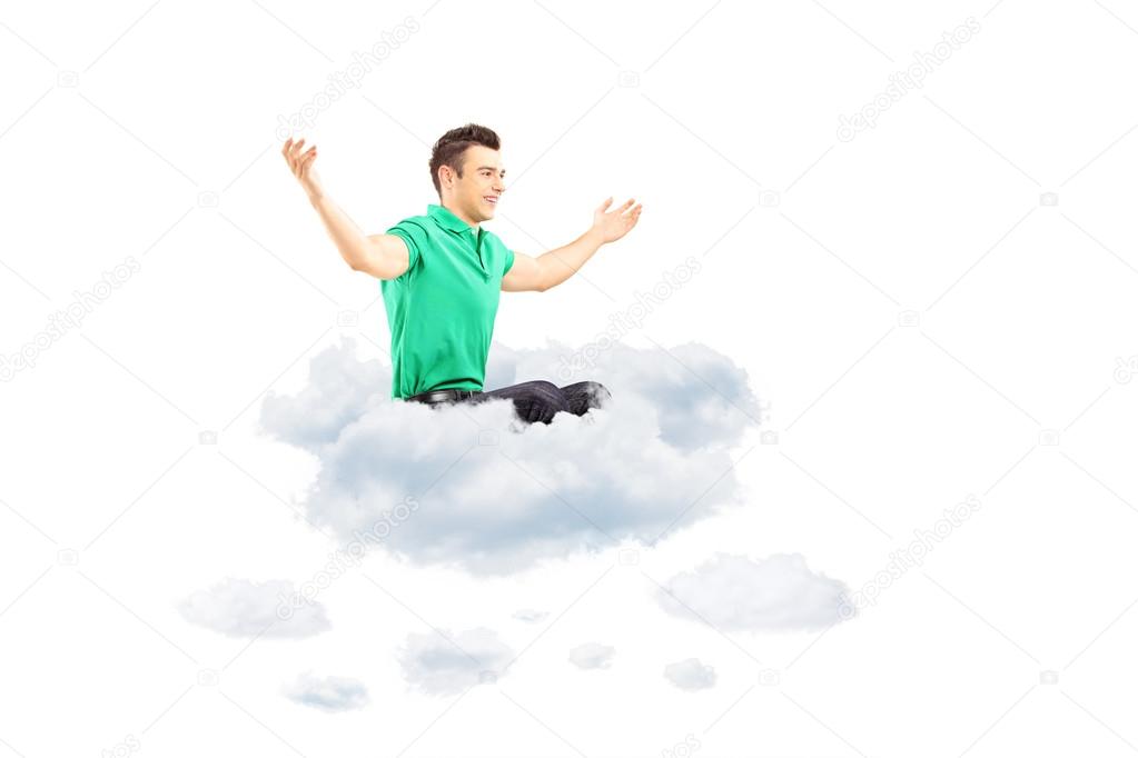 Male sitting on cloud and spreading arms