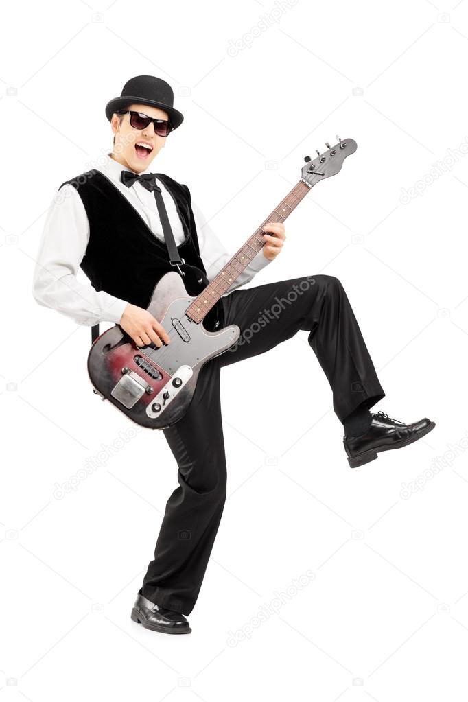 Euphoric man playing bass guitar Stock Photo by ©ljsphotography 45884427