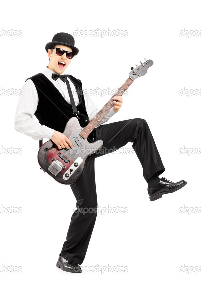 Euphoric man playing bass guitar Stock Photo by ©ljsphotography 45884427