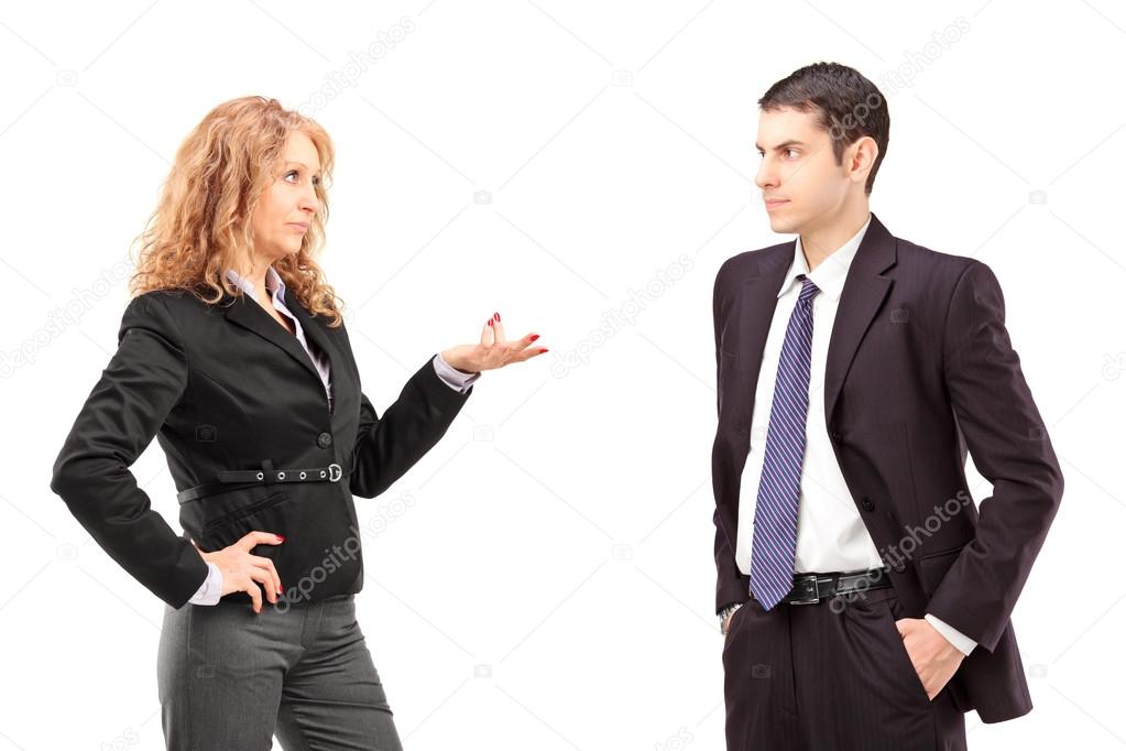 Female having conversation with colleague