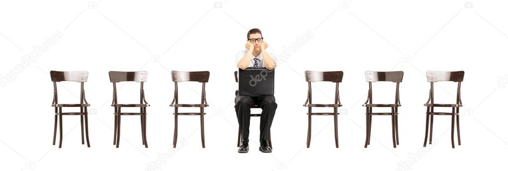 Bored man on chair