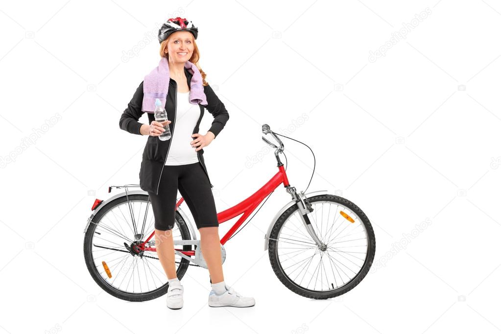 Woman resting after riding bike