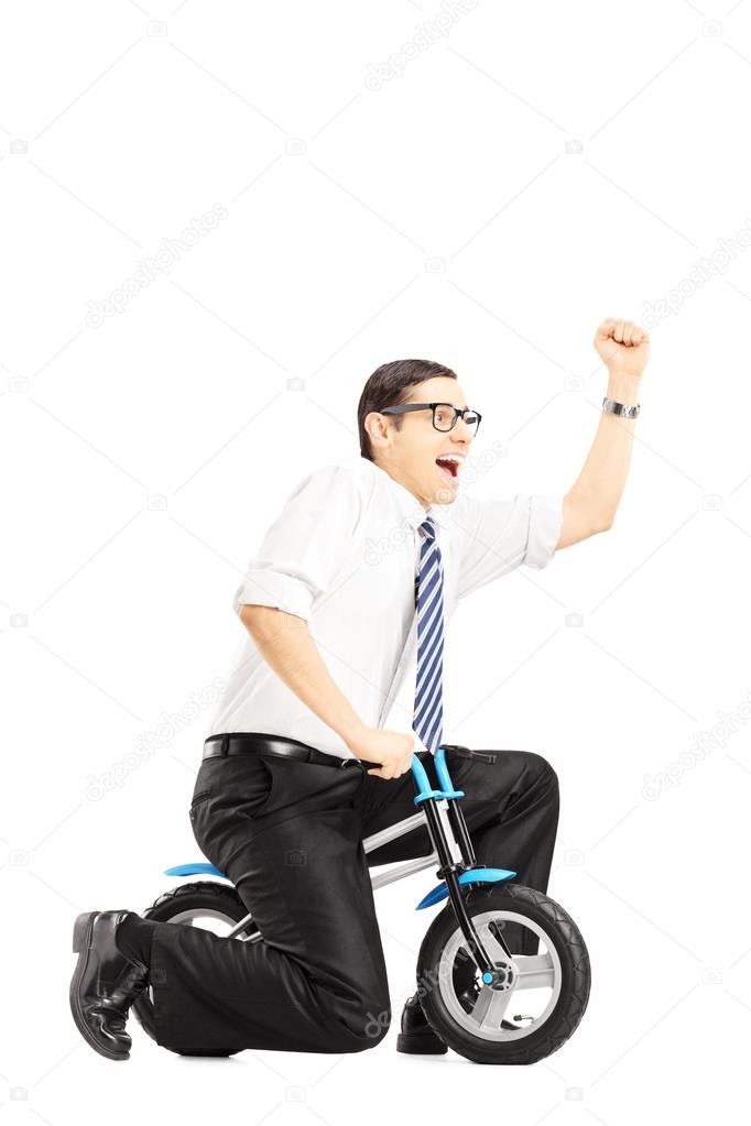 Businessperson riding bicycle