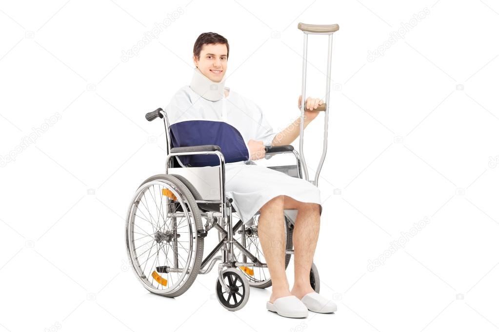Patient with broken arm in wheelchair