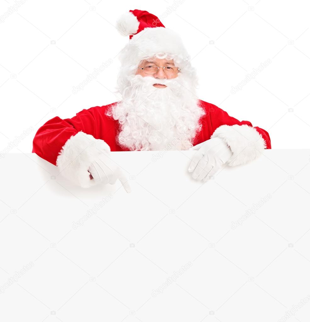 Santa claus behind blank billboard
