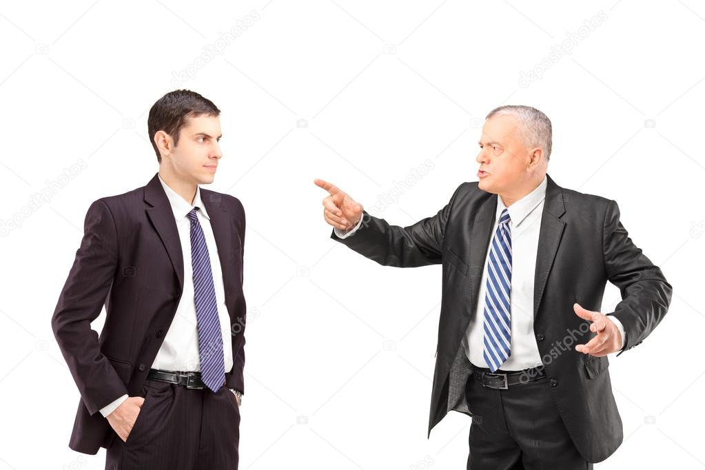 Man pointing towards young man