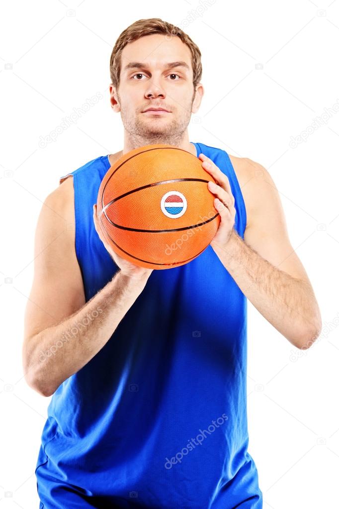 Basketball player shooting basketball