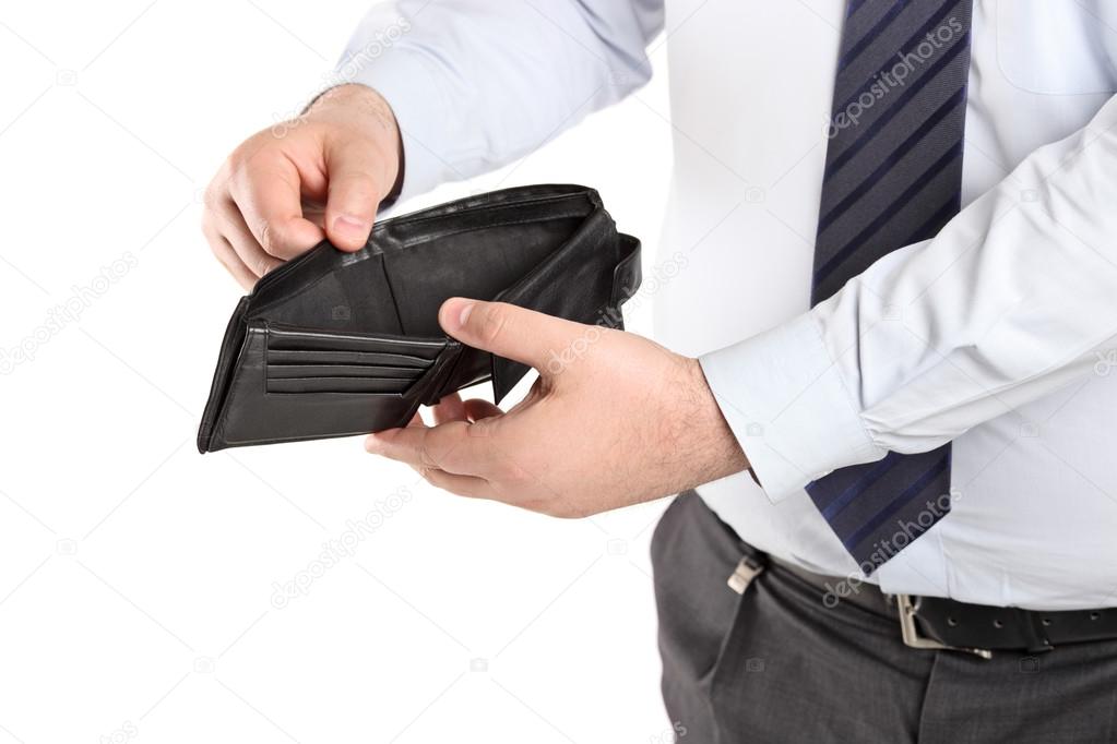 Man showing his empty wallet