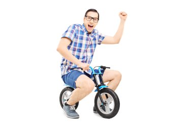 Man with raised fist riding bike clipart