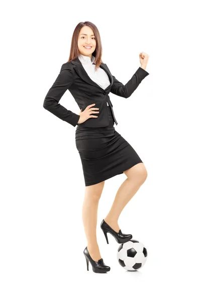 Businesswoman with a ball and thumb up — Stock Photo, Image