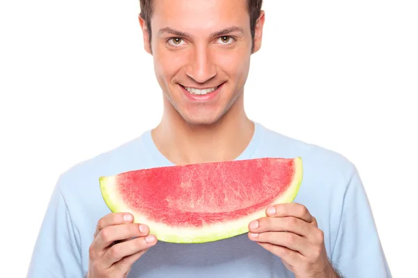 Mann hält Scheibe Wassermelone — Stockfoto