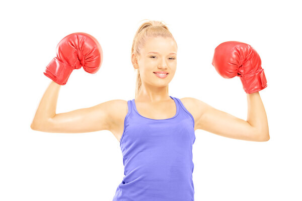 Female athlete wearing boxing gloves'