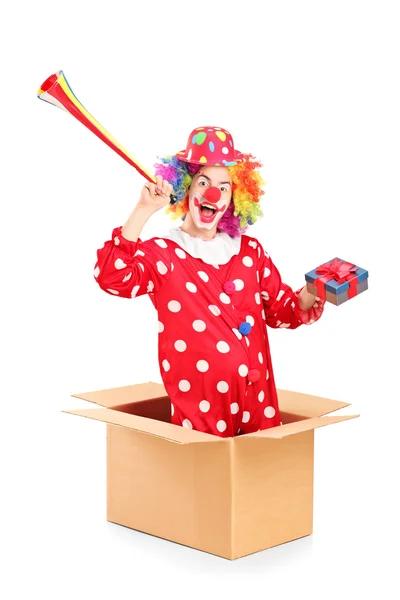 Clown coming out van vak — Stockfoto