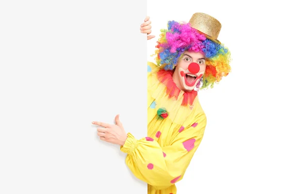 Clown derrière panneau vierge — Photo