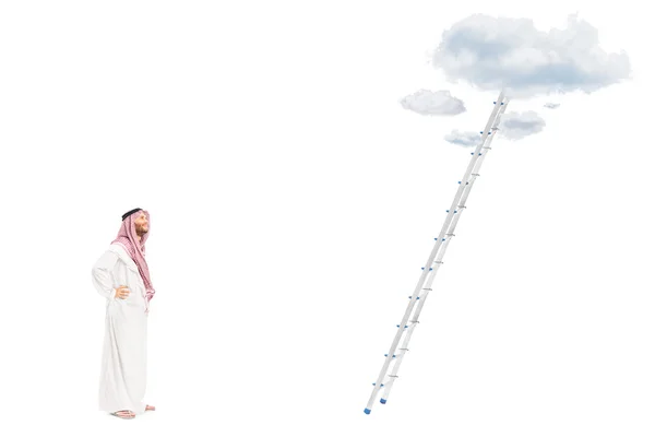 Male arab standing in front of ladder — Stock Photo, Image