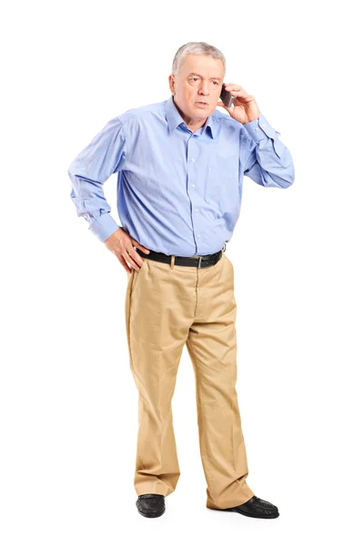 Mature man talking on the phone — Stock Photo, Image