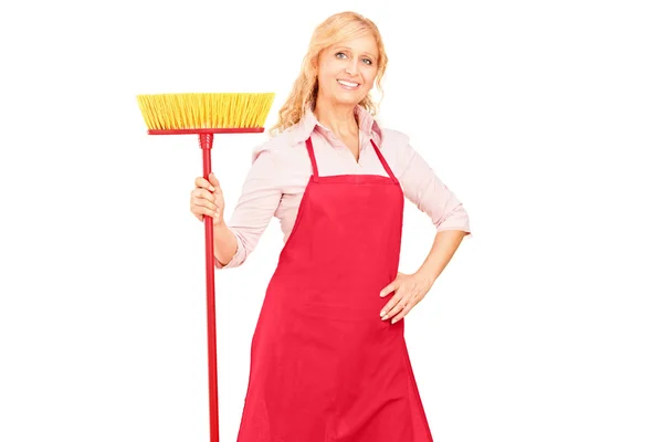 Mature female cleaner with brush — Stock Photo, Image