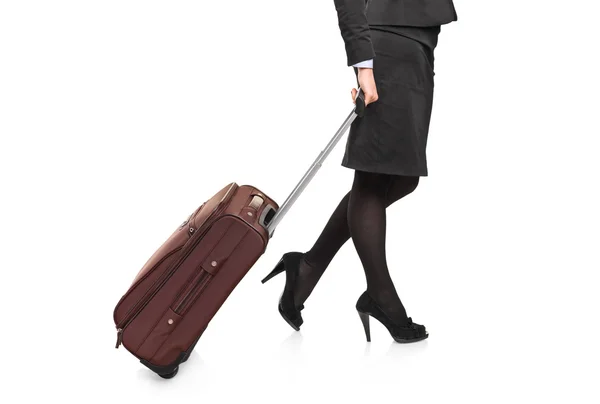 Businesswoman carrying luggage — Stock Photo, Image