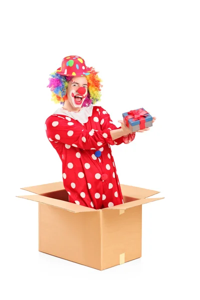 Klaun v lepenková krabice dárkové — Stock fotografie