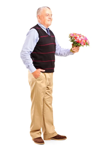 Gentleman holding flowers — Stock Photo, Image