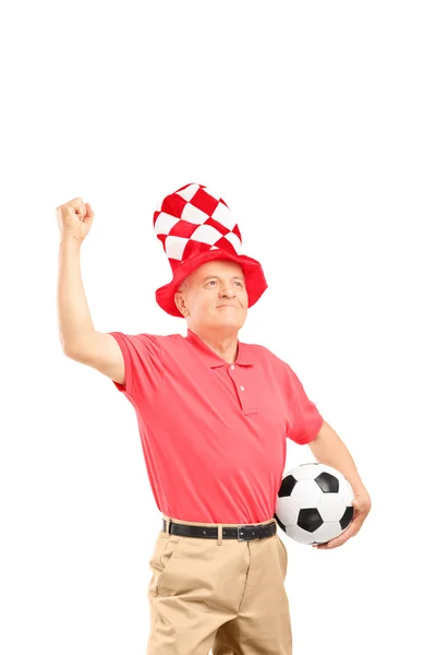 Starsze sport fan gospodarstwa piłka — Stockfoto