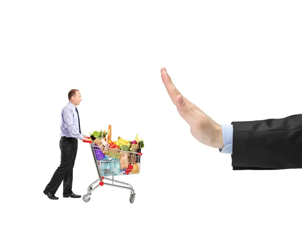 Man pushing shopping cart — Stock Photo, Image