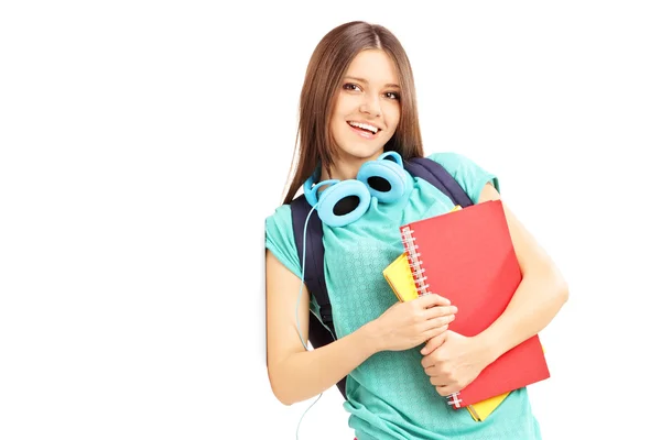 Vrouw met Schooltasje en hoofdtelefoons — Stockfoto