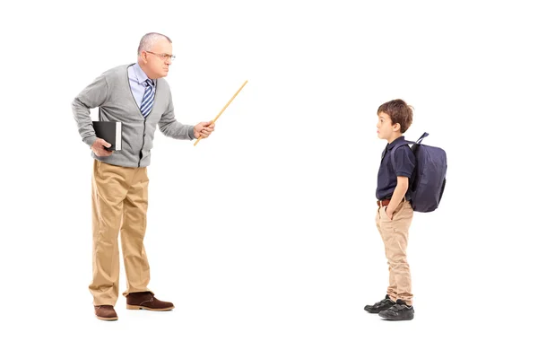 Angry teacher shouting at schoolboy — Stock Photo, Image