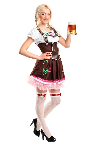 Woman holding beer glass — Stock Photo, Image