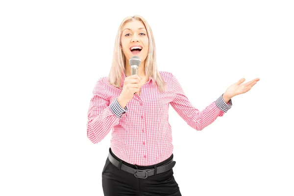 Female singing on a microphone — Stock Photo, Image