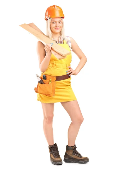 Female carpenter holding sills — Stock Photo, Image