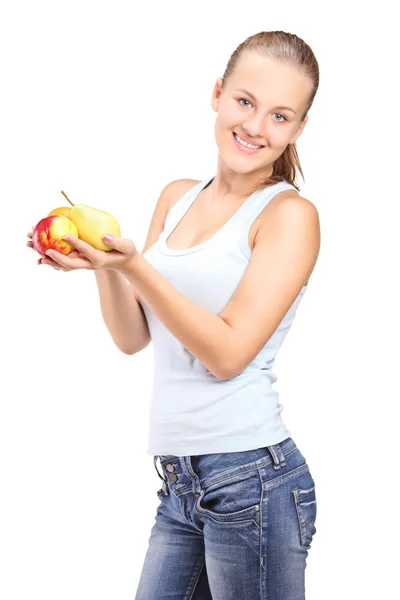 Una hermosa joven sosteniendo varios frutos — Foto de Stock