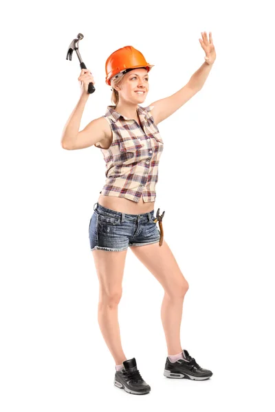 Female manual worker with hammer — Stock Photo, Image