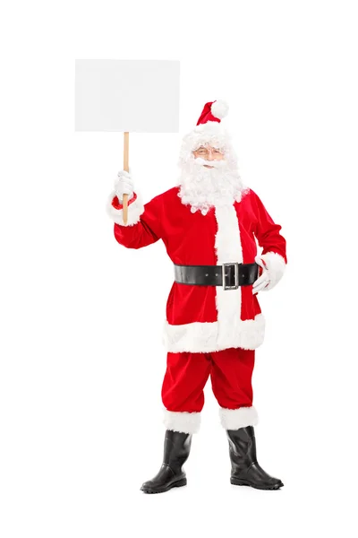 Санта Клаус держит пустую панель — стоковое фото