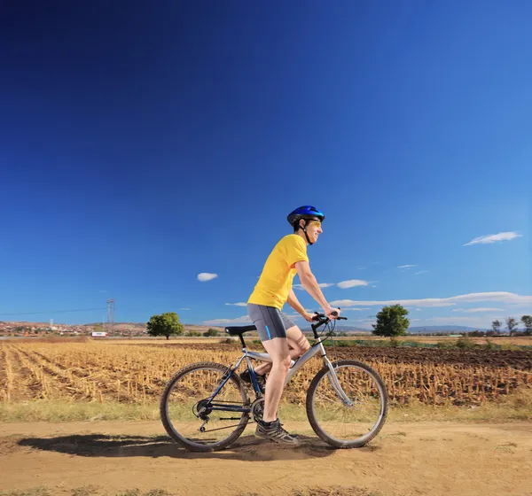 Male riding bike outdoor — Stock Photo, Image