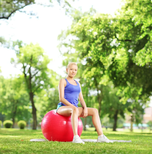 Female athlete on a pilates ball Stock Image