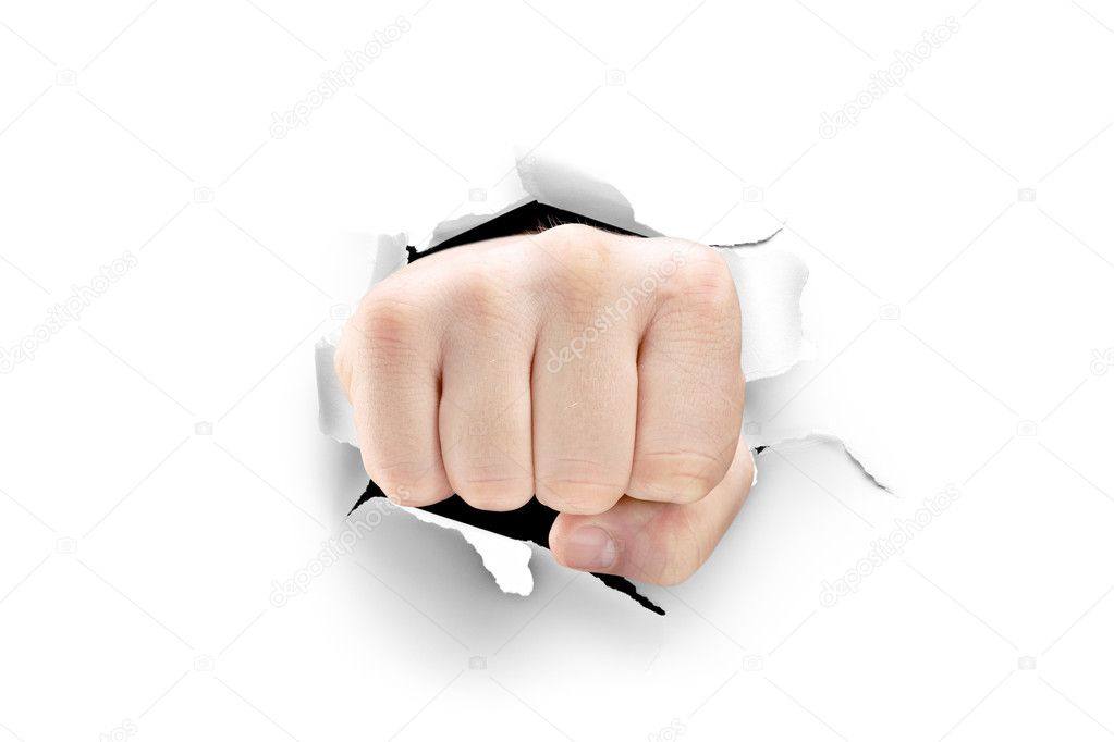 Male fist breaking through paper