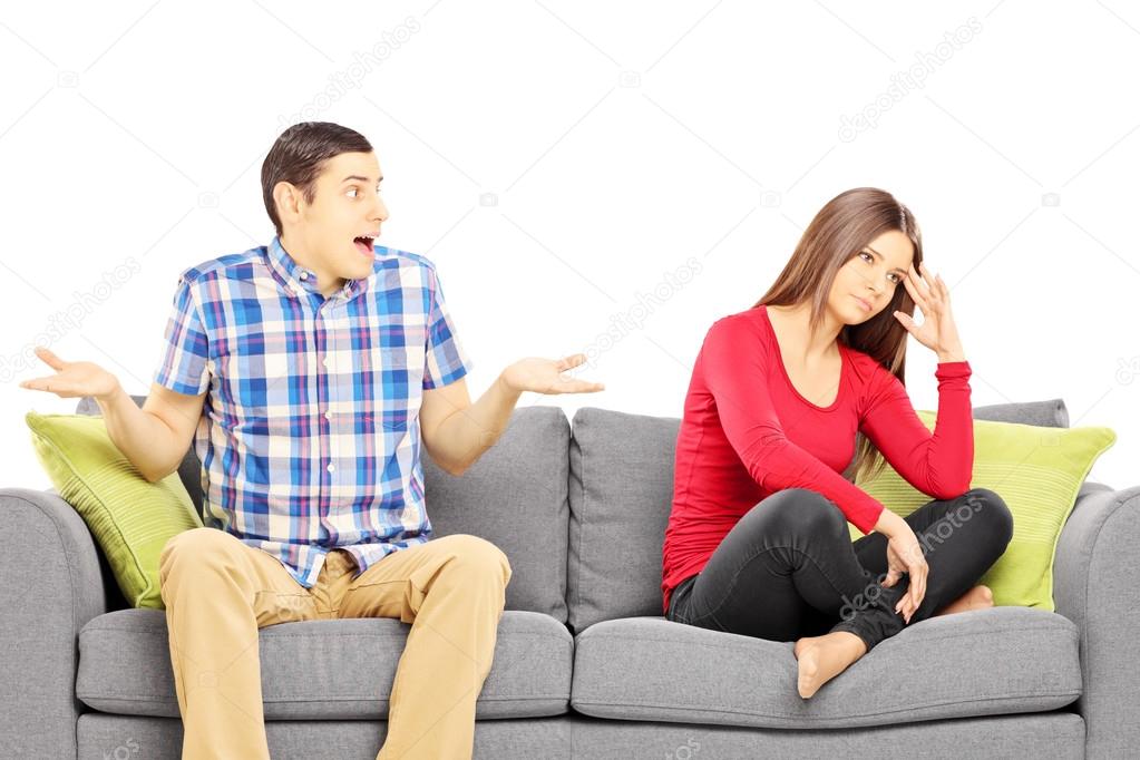 Couple on a sofa during an argument