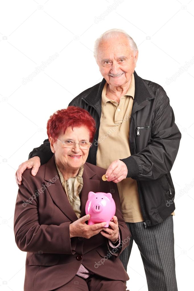 Mature people putting coin