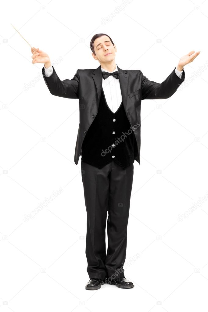 Male orchestra conductor directing