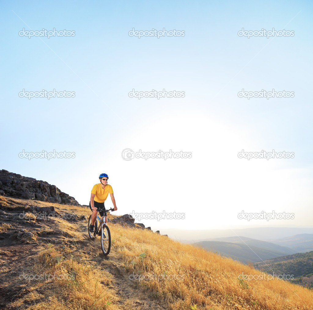 Male riding mountain bike